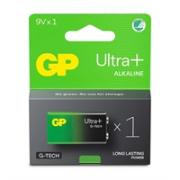 En fyrkantig förpackning  med batteri inuti, förpackningen är grön och svart i färgen.